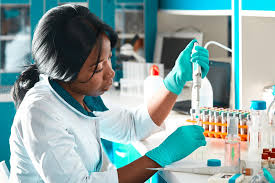 Medical laboratory technician analyzing samples